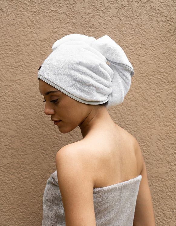 White hair towel with gray piped edge and gray classic towel